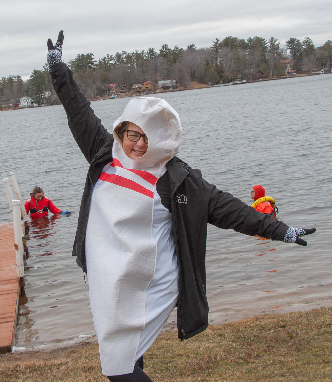 Sullivan County Chamber of Commerce president Jaime Schmeiser was all smiles before taking a jump in the lake at the Polar Bear Jump fundraiser last weekend.
